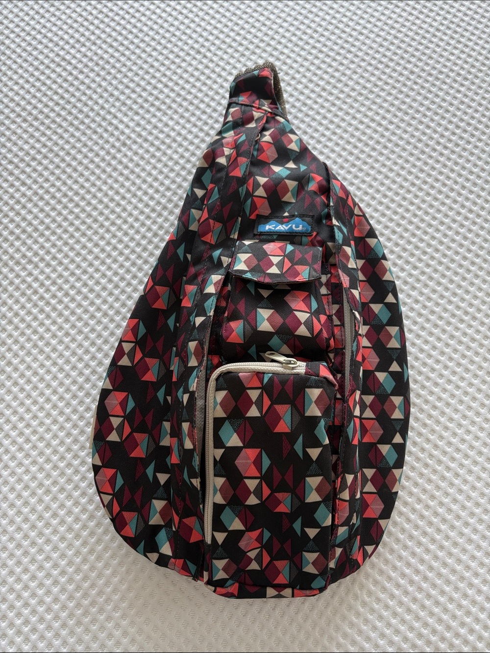 Kavu Geometric Pattern Sling Bag - Black, Red, Teal